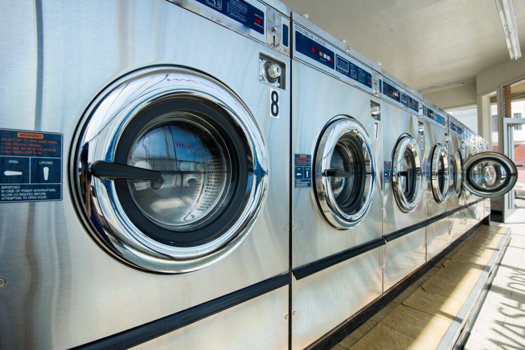 Row of washers in laundromat